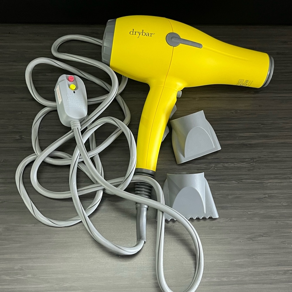 Drybar Vibrant Yellow Hair Dryer with Gray Attachments